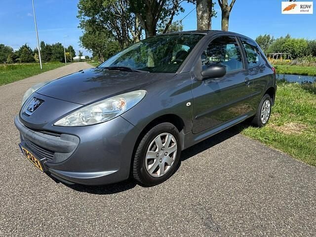 Grijs Gebruikt 2011 Peugeot 206+ Hatchback | € 1.250 (Goede deal) - Afbeelding 1/4
