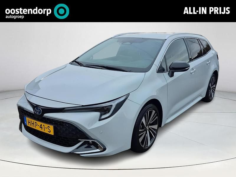 Grijs Gebruikt 2025 Toyota Corolla Hybrid Stationwagen | € 32.950 - Afbeelding 1/4