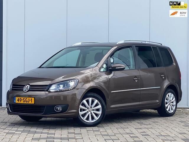 Bruin Gebruikt 2011 VW Touran Highline MPV | € 7.400 (Iets duurder) - Afbeelding 1/4