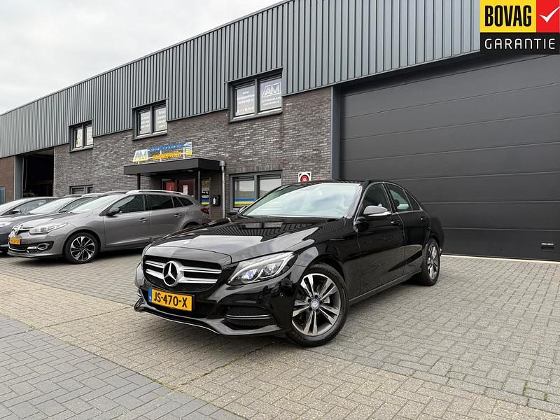 Zwart Gebruikt 2015 Mercedes C180 Prestige Sedan | € 19.750 (Goede deal) - Afbeelding 1/4