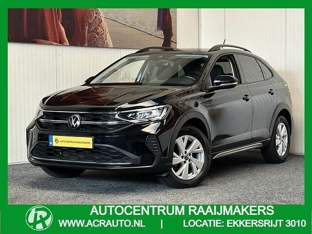 Zwart (metallic) Gebruikt 2023 VW Taigo Style SUV | € 21.740 (Goede deal) - Afbeelding 1/4