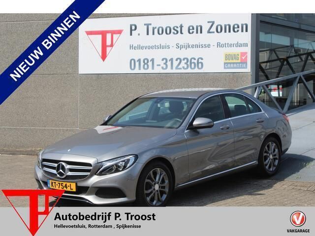 Grijs, metallic lak Gebruikt 2015 Mercedes C180 Prestige Sedan | € 19.450 (Eerlijke prijs) - Afbeelding 1/4