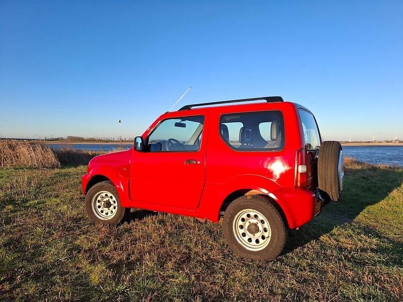 Rood Gebruikt 2004 Suzuki Jimny SUV | € 6.250 (Goede deal) - Afbeelding 1/4