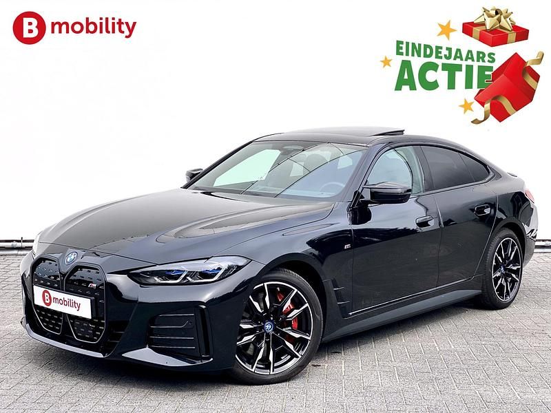 Zwart (metallic) Gebruikt 2022 BMW i4 Executive Sedan | € 49.695 (Iets duurder) - Afbeelding 1/3