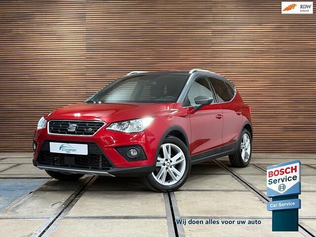 Rood (metallic) Gebruikt 2018 Seat Arona FR SUV | € 13.889 (Eerlijke prijs) - Afbeelding 1/4