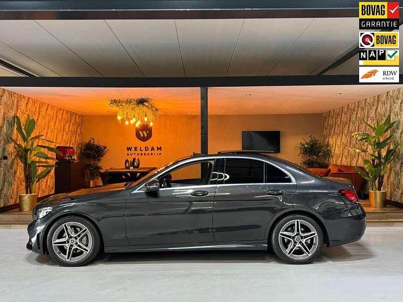 Grijs, metallic lak Gebruikt 2020 Mercedes C200 Business Sedan | € 33.990 (Iets duurder) - Afbeelding 1/4