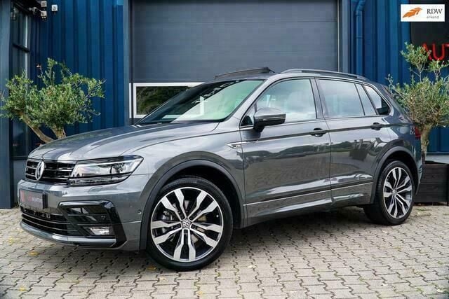 Grijs, metallic lak Gebruikt 2019 VW Tiguan Highline SUV | € 44.950 - Afbeelding 1/4