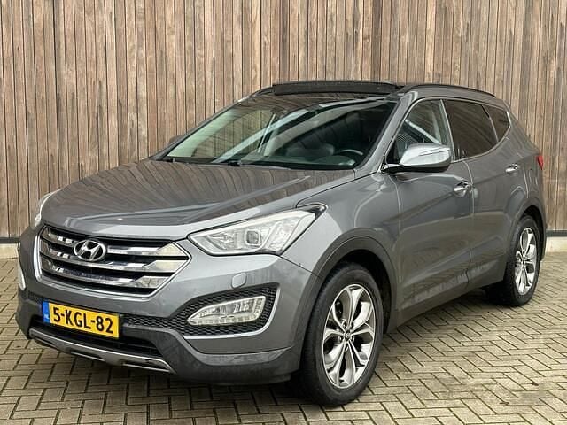 Grijs (metallic) Occasion 2013 Hyundai Santa Fe SUV | € 8.999 - Afbeelding 1/4