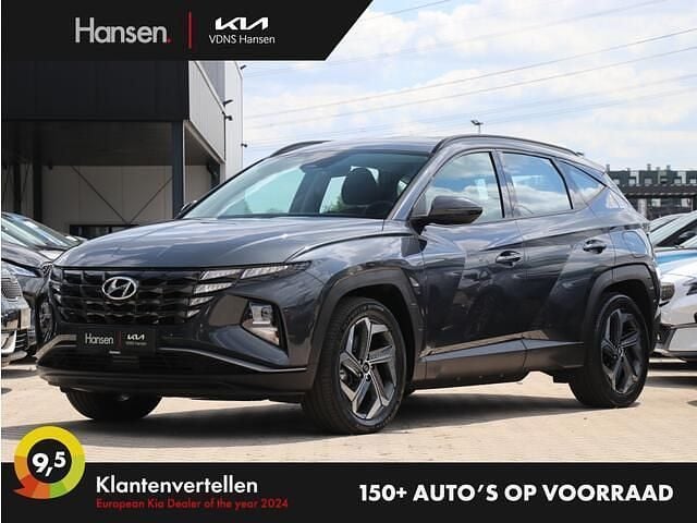 Grijs, metallic lak Gebruikt 2022 Hyundai Tucson Comfort SUV | € 28.945 (Super prijs) - Afbeelding 1/4