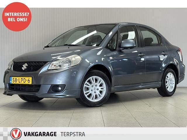 Grijs (metallic) Occasion 2010 Suzuki SX4 Exclusive Sedan | € 2.995 (Super prijs) - Afbeelding 1/4