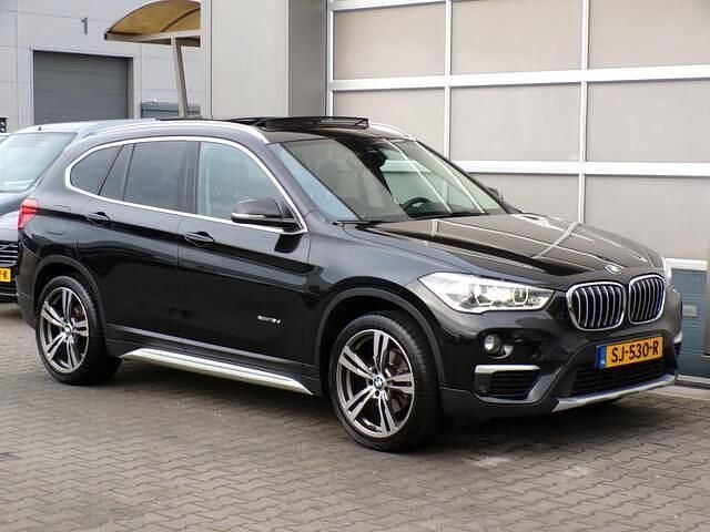 Zwart Gebruikt 2017 BMW X1 Executive SUV | € 15.950 (Super prijs) - Afbeelding 1/4