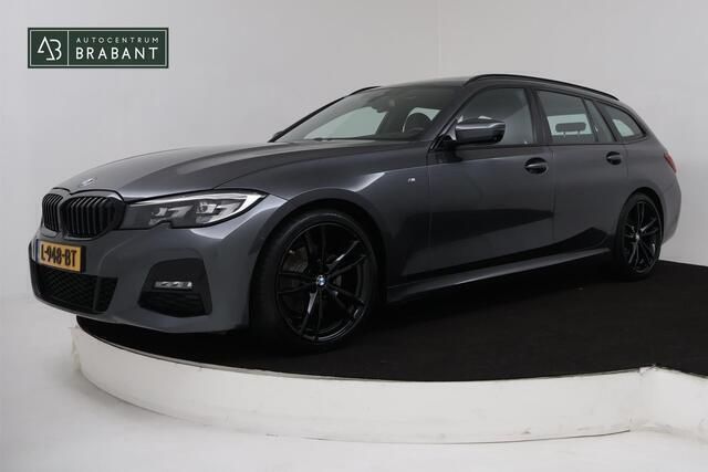 Grijs Gebruikt 2021 BMW 320 Executive Stationwagen | € 26.945 (Goede deal) - Afbeelding 1/4