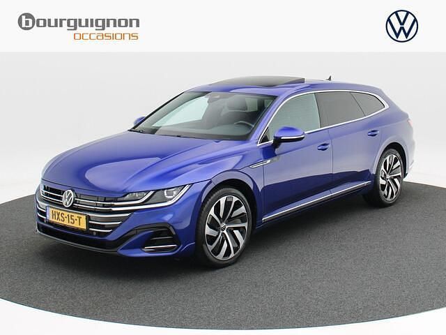 Blauw, metallic lak Gebruikt 2021 VW Arteon R Stationwagen | € 30.850 (Eerlijke prijs) - Afbeelding 1/4