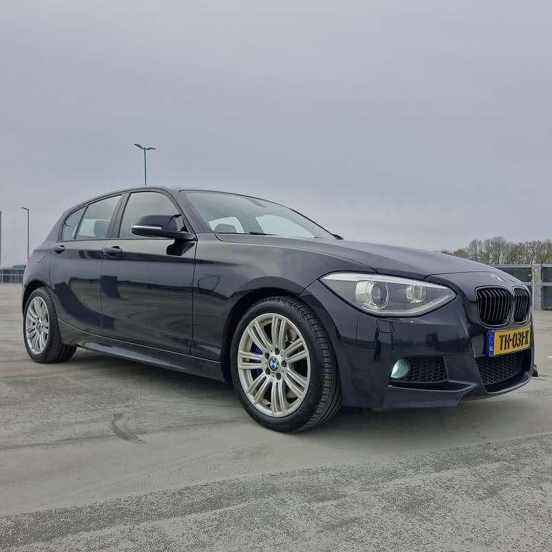 Zwart Occasion 2012 BMW 116 Hatchback | € 7.750 (Duur) - Afbeelding 1/4
