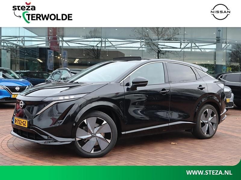 Zwart Gebruikt 2022 Nissan Ariya Advance SUV | € 29.445 (Eerlijke prijs) - Afbeelding 1/4