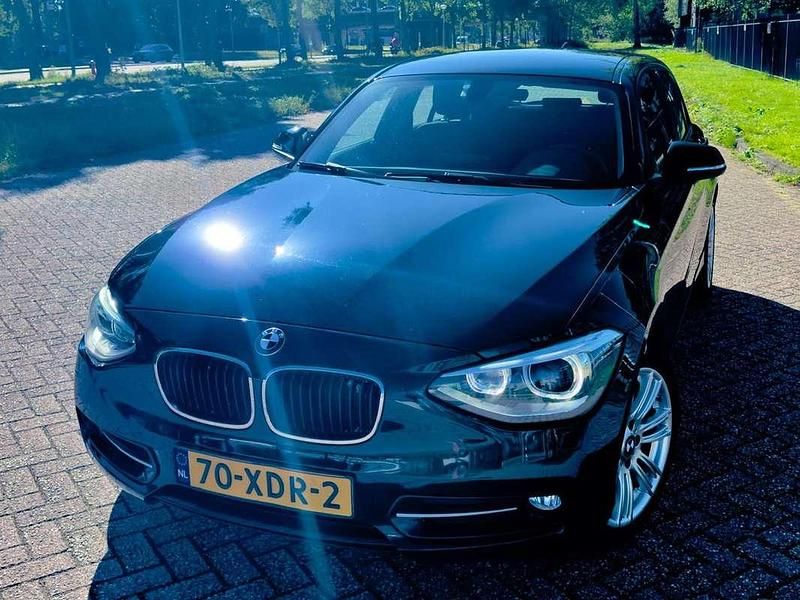 Blauw Gebruikt 2012 BMW 116 Sport Line Hatchback | € 7.750 - Afbeelding 1/4