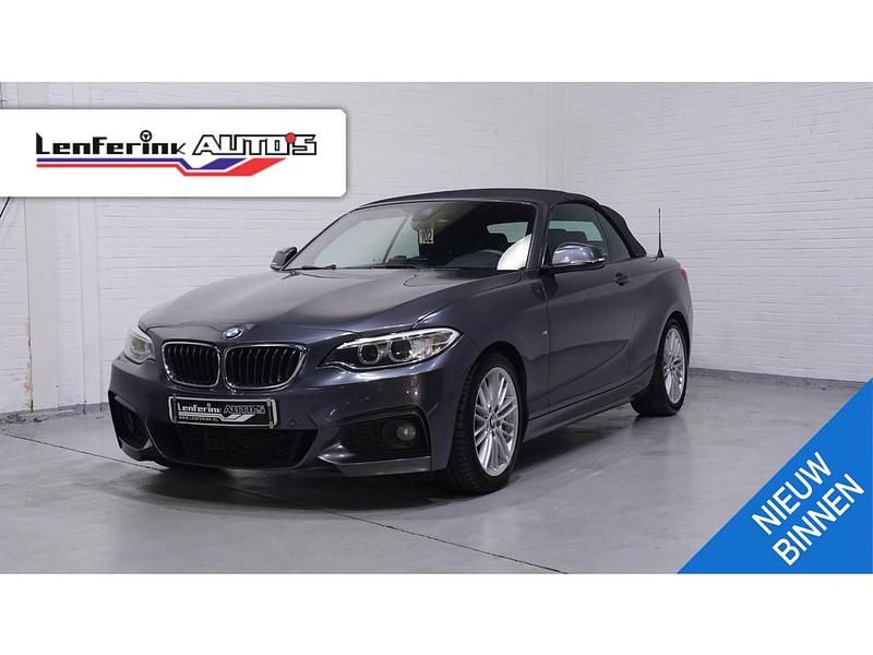 Grijs Gebruikt 2015 BMW 225 M Sport Cabriolet | € 12.995 - Afbeelding 1/4