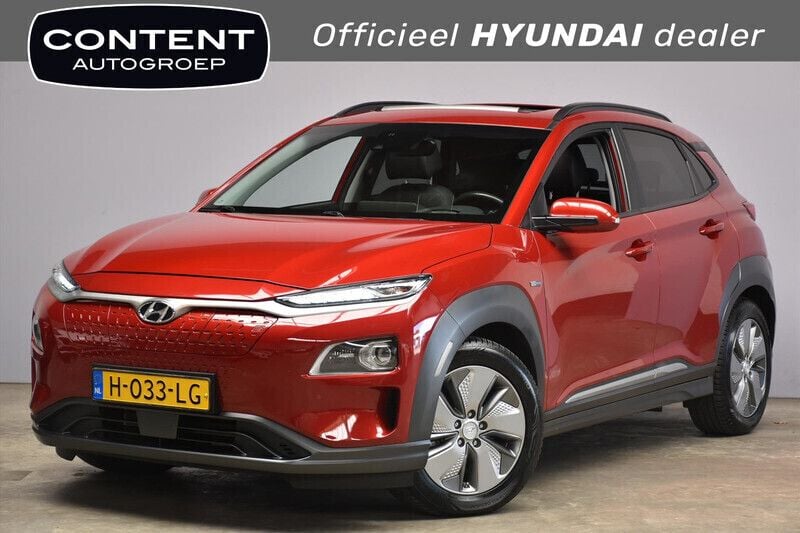 Rood metallic Gebruikt 2020 Hyundai Kona Premium SUV | € 21.440 (Eerlijke prijs) - Afbeelding 1/4