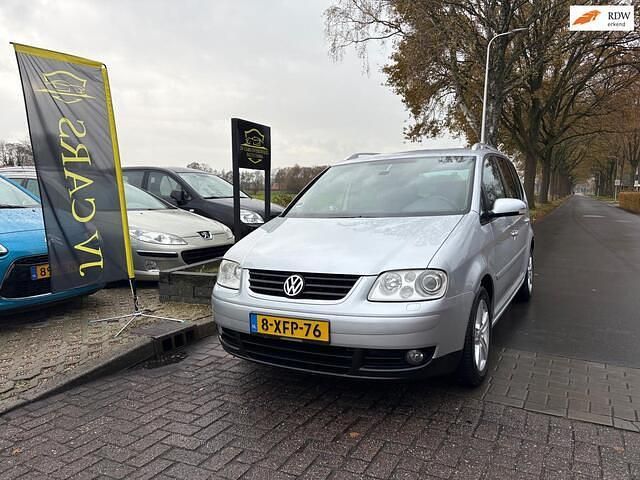 Grijs (metallic) Gebruikt 2006 VW Touran Highline MPV | € 2.950 (Iets duurder) - Afbeelding 1/4