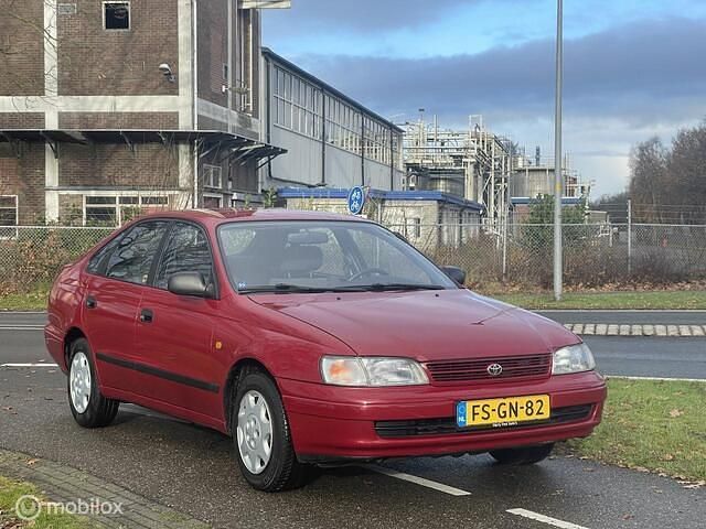 Rood Gebruikt 1992 Toyota Carina Hatchback | € 5.999 - Afbeelding 1/4