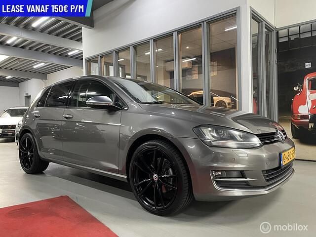 Grijs Gebruikt 2014 VW Golf VII Highline Hatchback | € 9.500 (Eerlijke prijs) - Afbeelding 1/4