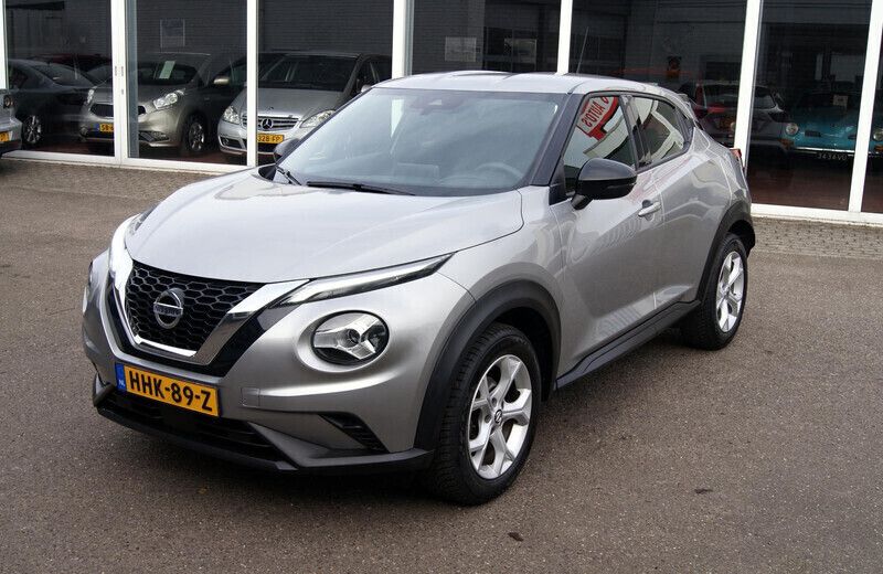 Grijs Gebruikt 2020 Nissan Juke Acenta SUV | € 17.650 (Eerlijke prijs) - Afbeelding 1/4