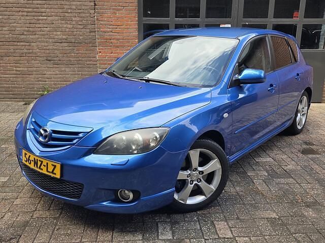 Blauw Gebruikt 2004 Mazda 3 Inclusive Hatchback | € 2.750 (Eerlijke prijs) - Afbeelding 1/4