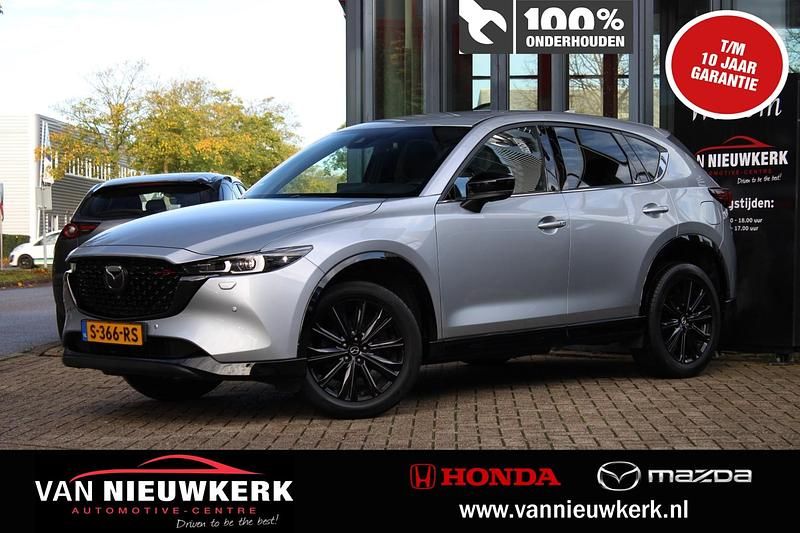 Sonic silver (grijs metallic) Gebruikt 2022 Mazda CX-5 Homura-Line SUV | € 36.900 (Eerlijke prijs) - Afbeelding 1/4