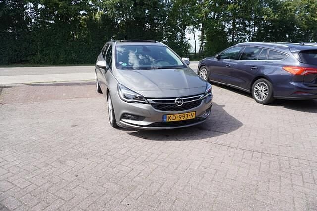 Bruin Gebruikt 2016 Opel Astra Business Stationwagen | € 7.844 (Eerlijke prijs) - Afbeelding 1/4