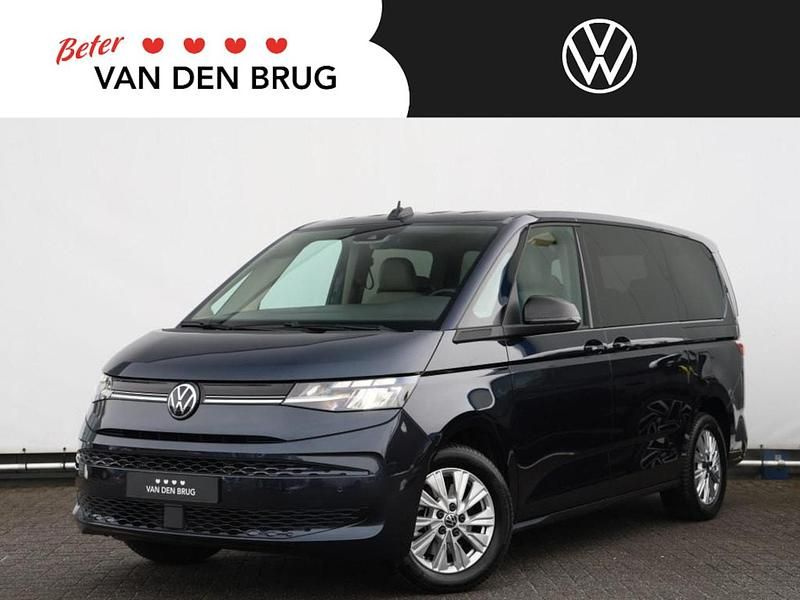 Blauw Gebruikt 2023 VW Multivan Business Van | € 54.400 (Eerlijke prijs) - Afbeelding 1/4