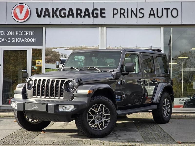 Grijs Occasion 2022 Jeep Wrangler Unlimited Sahara SUV | € 56.800 (Eerlijke prijs) - Afbeelding 1/4