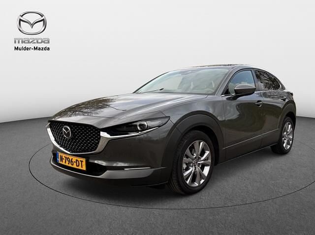 Machine grey (grijs metallic) Gebruikt 2021 Mazda CX-30 Sportive SUV | € 24.950 (Goede deal) - Afbeelding 1/3