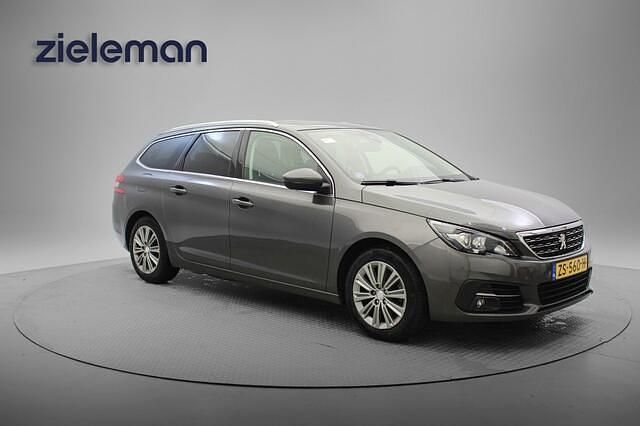 Grijs Gebruikt 2019 Peugeot 308 Premium Stationwagen | € 9.845 (Goede deal) - Afbeelding 1/4