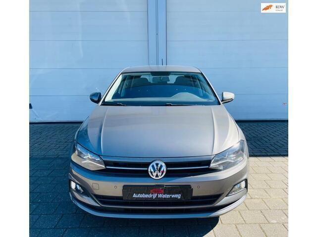 Grijs Gebruikt 2018 VW Polo Comfortline Hatchback | € 15.500 (Eerlijke prijs) - Afbeelding 1/4