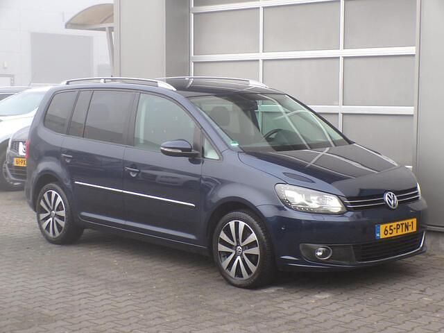 Blauw Gebruikt 2010 VW Touran Highline MPV | € 5.950 (Eerlijke prijs) - Afbeelding 1/4
