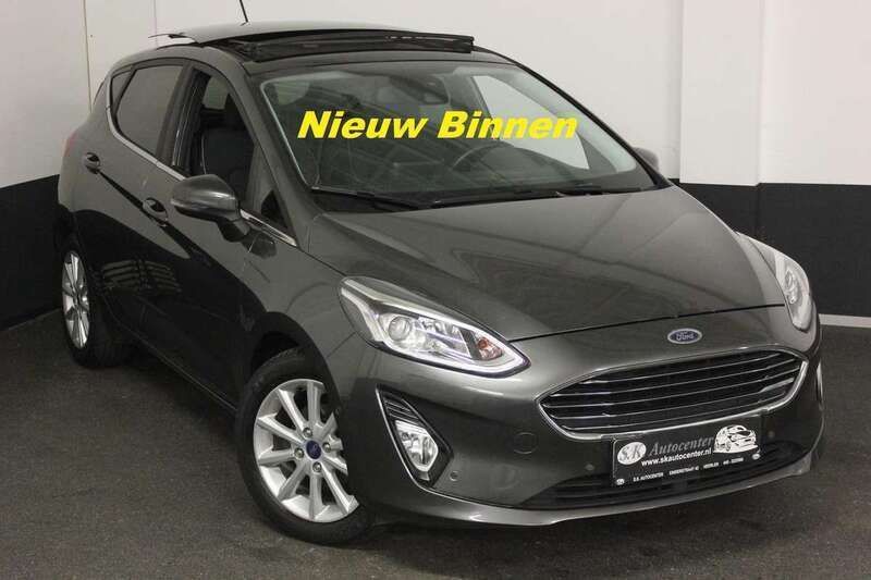 Groen, metallic lak Gebruikt 2018 Ford Fiesta Titanium Hatchback | € 16.750 (Eerlijke prijs) - Afbeelding 1/4