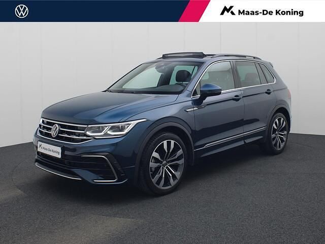 Blauw Occasion 2022 VW Tiguan R-line SUV | € 39.440 (Super prijs) - Afbeelding 1/4