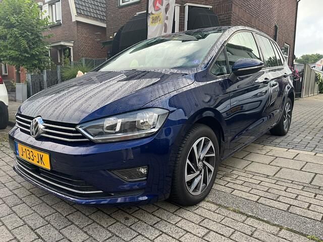 Blauw Gebruikt 2017 VW Golf Sportsvan Highline MPV | € 14.900 (Eerlijke prijs) - Afbeelding 1/4