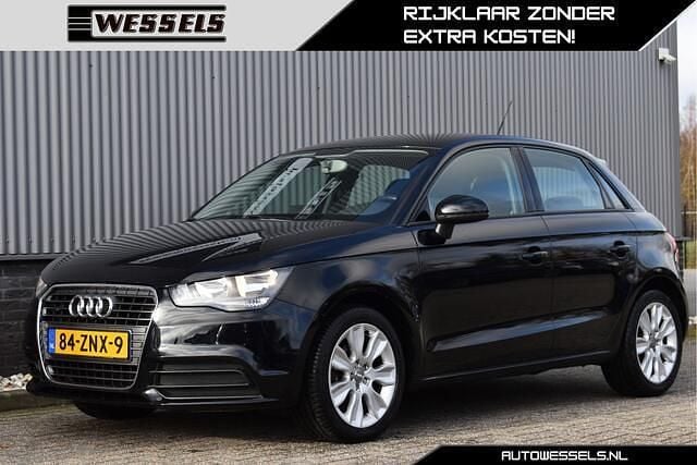 Zwart (metallic) Gebruikt 2013 Audi A1 Sportback Basis Hatchback | € 10.250 (Goede deal) - Afbeelding 1/4