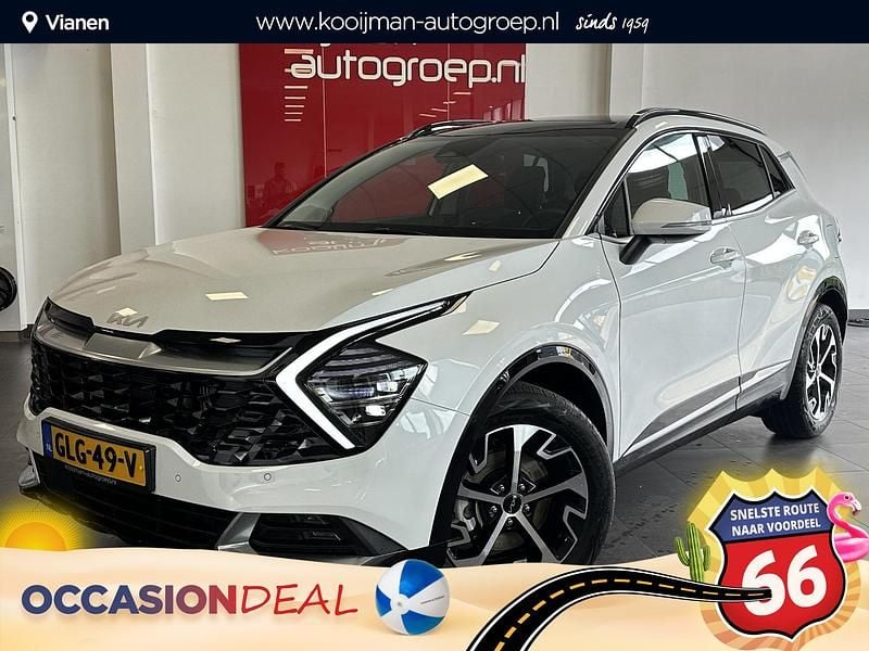 Deluxe white m Gebruikt 2024 Kia Sportage SUV | € 41.950 (Eerlijke prijs) - Afbeelding 1/4