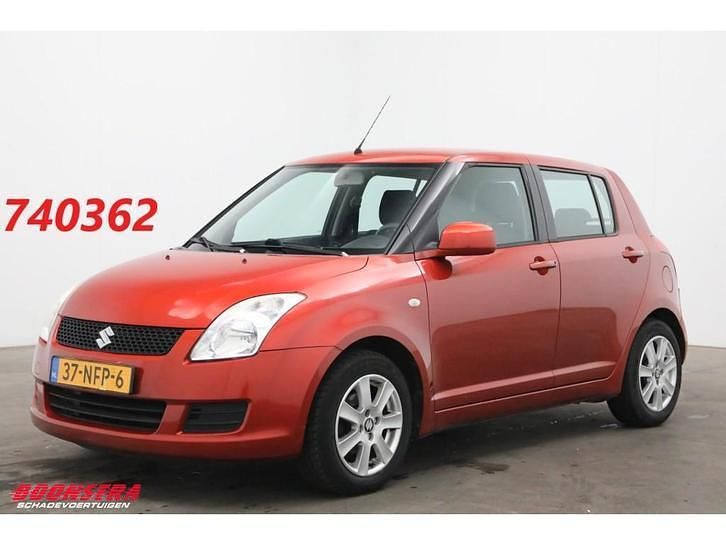 Oranje (parellak) Gebruikt 2010 Suzuki Swift Cool Hatchback | € 2.450 (Eerlijke prijs) - Afbeelding 1/4