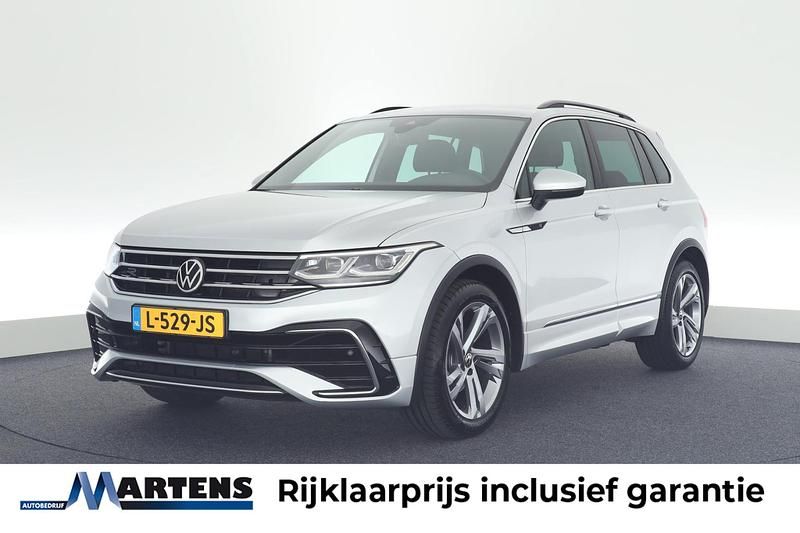 Grijs Gebruikt 2021 VW Tiguan R-line SUV | € 32.749 (Eerlijke prijs) - Afbeelding 1/4