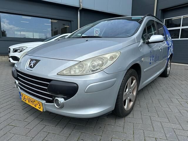 Grijs, andere lak Gebruikt 2007 Peugeot 307 Stationwagen | € 650 (Eerlijke prijs) - Afbeelding 1/4