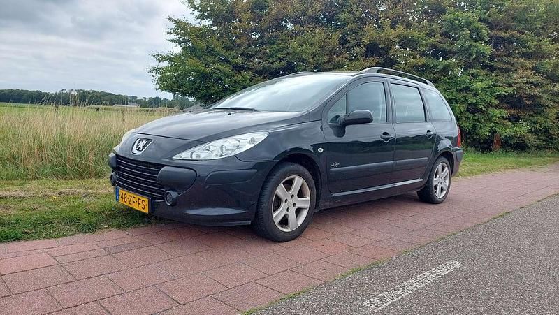 Zwart Gebruikt 2008 Peugeot 307 Stationwagen | € 1.250 (Eerlijke prijs) - Afbeelding 1/4