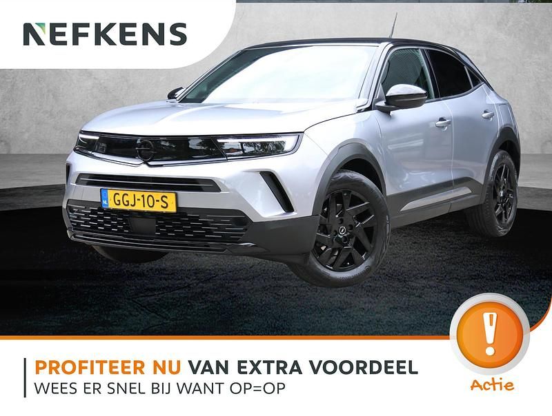 Grijs Gebruikt 2024 Opel Mokka SUV | € 27.600 - Afbeelding 1/4
