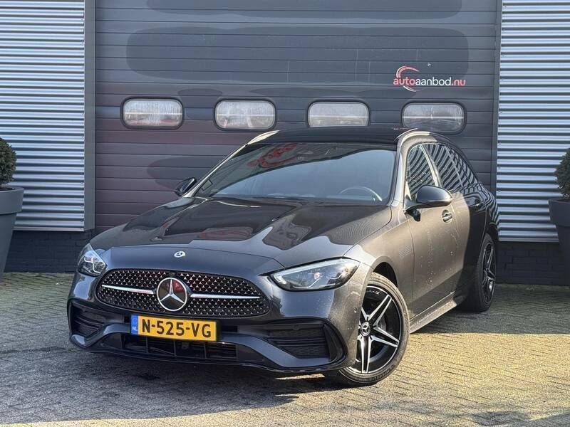 Grijs Gebruikt 2022 Mercedes E300 AMG line Stationwagen | € 31.400 (Goede deal) - Afbeelding 1/4