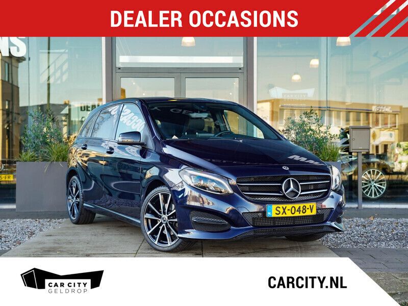 Blauw Gebruikt 2018 Mercedes B180 Ambition MPV | € 20.440 (Eerlijke prijs) - Afbeelding 1/4