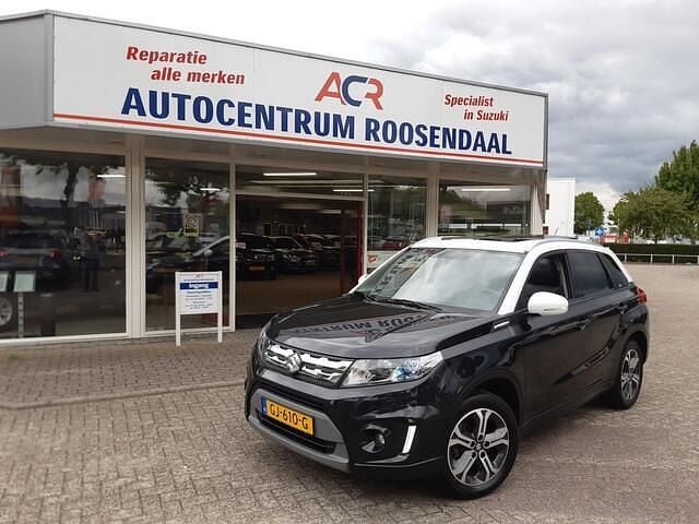 Zwart, metallic lak Gebruikt 2015 Suzuki Vitara SUV | € 14.749 (Eerlijke prijs) - Afbeelding 1/4