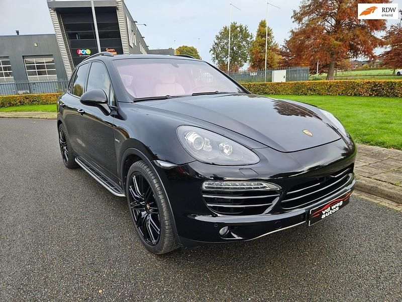 Zwart Gebruikt 2012 Porsche Cayenne SUV | € 34.950 (Goede deal) - Afbeelding 1/4