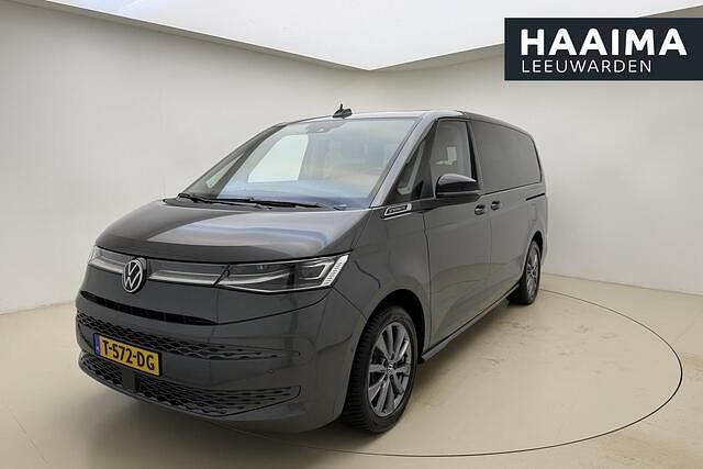Grijs Gebruikt 2023 VW Multivan Business Van | € 49.950 - Afbeelding 1/4